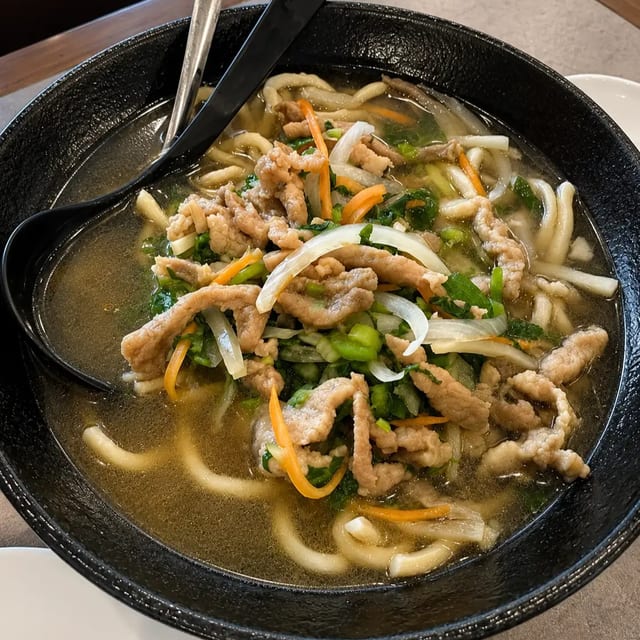 Pork With Preserved Vegetable Noodle Soup.